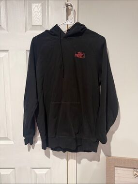 The North Face Black Pullover Hoodie with Red Logo